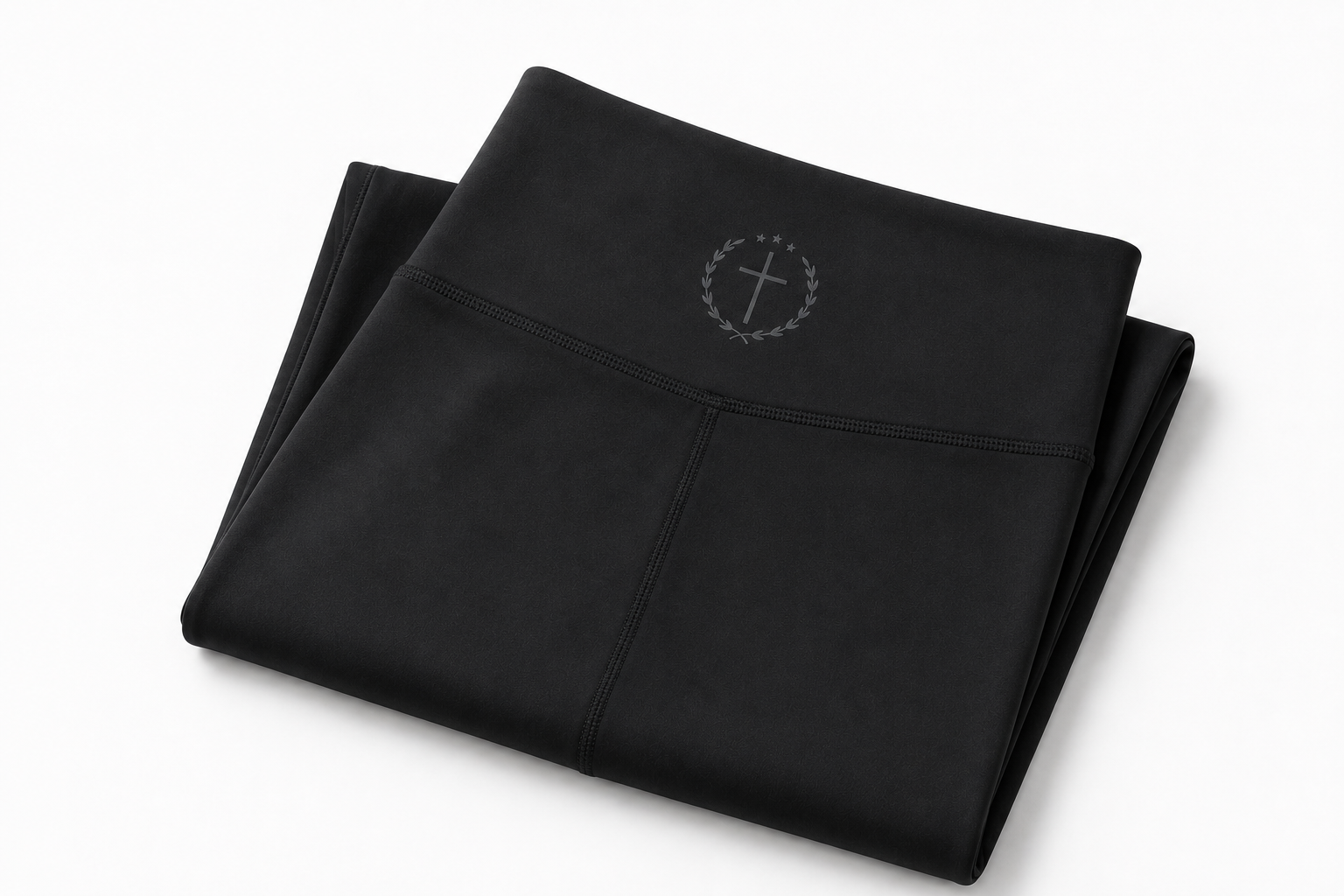 Folded black leggings with small waistband logo, full length