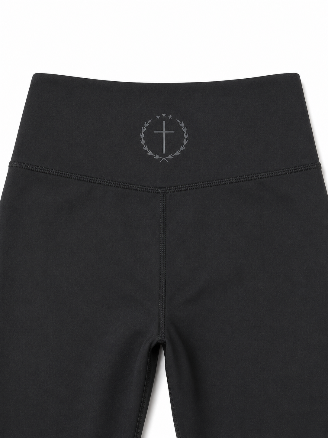 Black leggings with waistband logo and side seam detail, full length