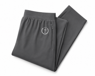 Gray joggers folded, elastic waist and drawstring, circular logo emblem on front